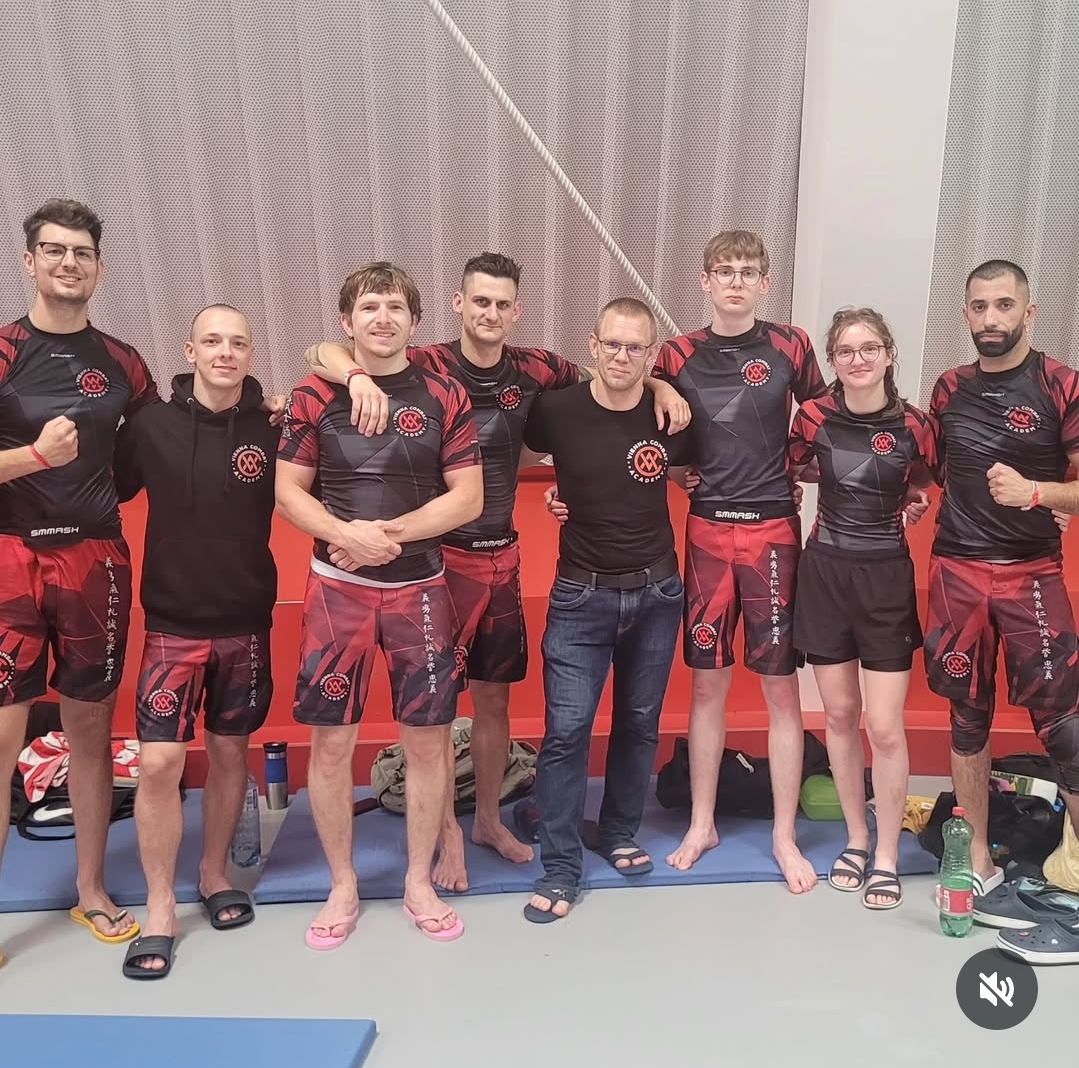 Team posing after a successful ADCC tournament